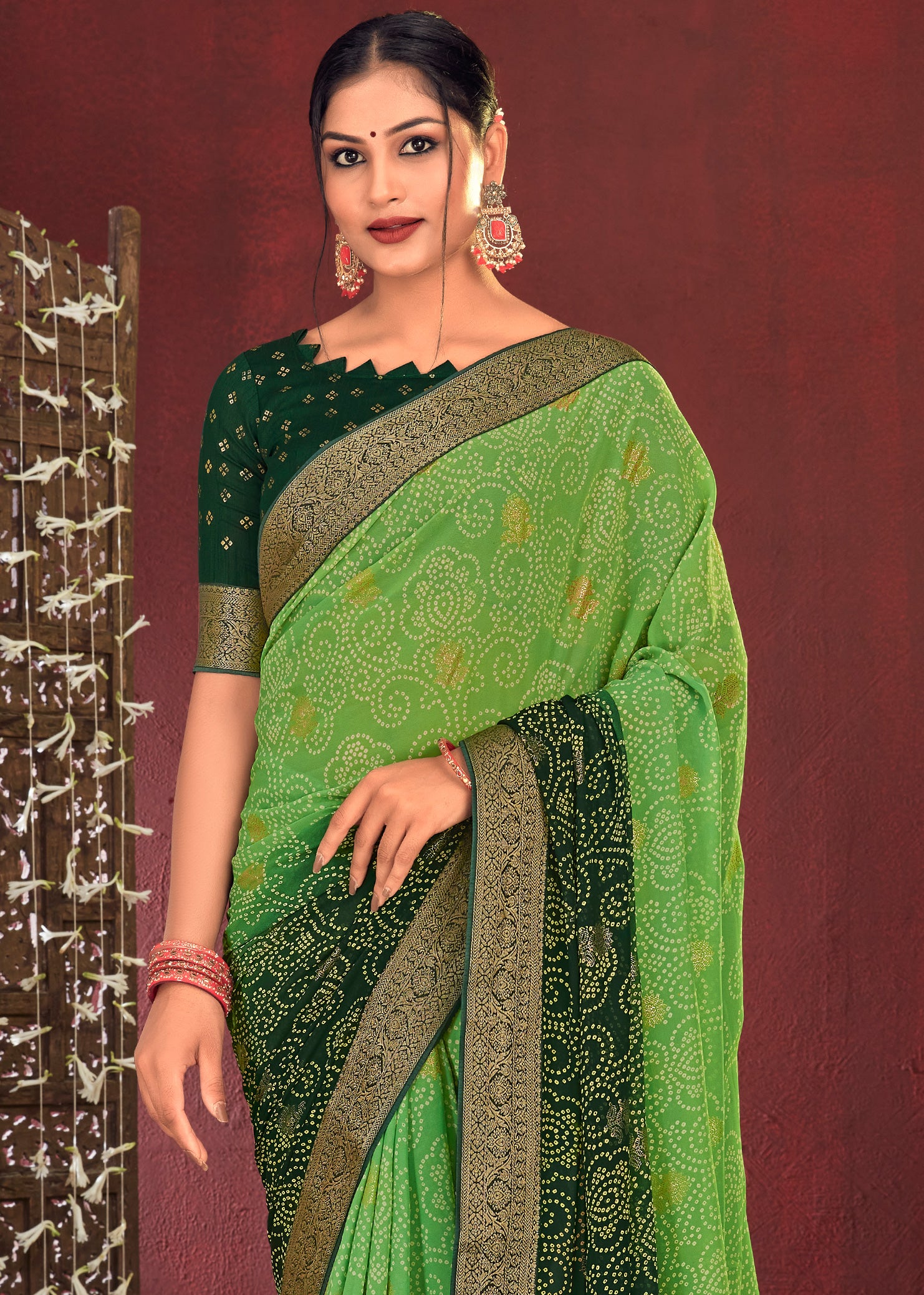 Dual Shades Bandhani Printed Dark Green Weightless Georgette Saree With Embroidery Lace