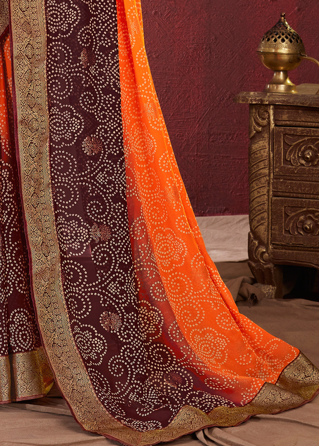 Dual Shades Bandhani Printed Maroon Orange Weightless Georgette Saree With Embroidery Lace