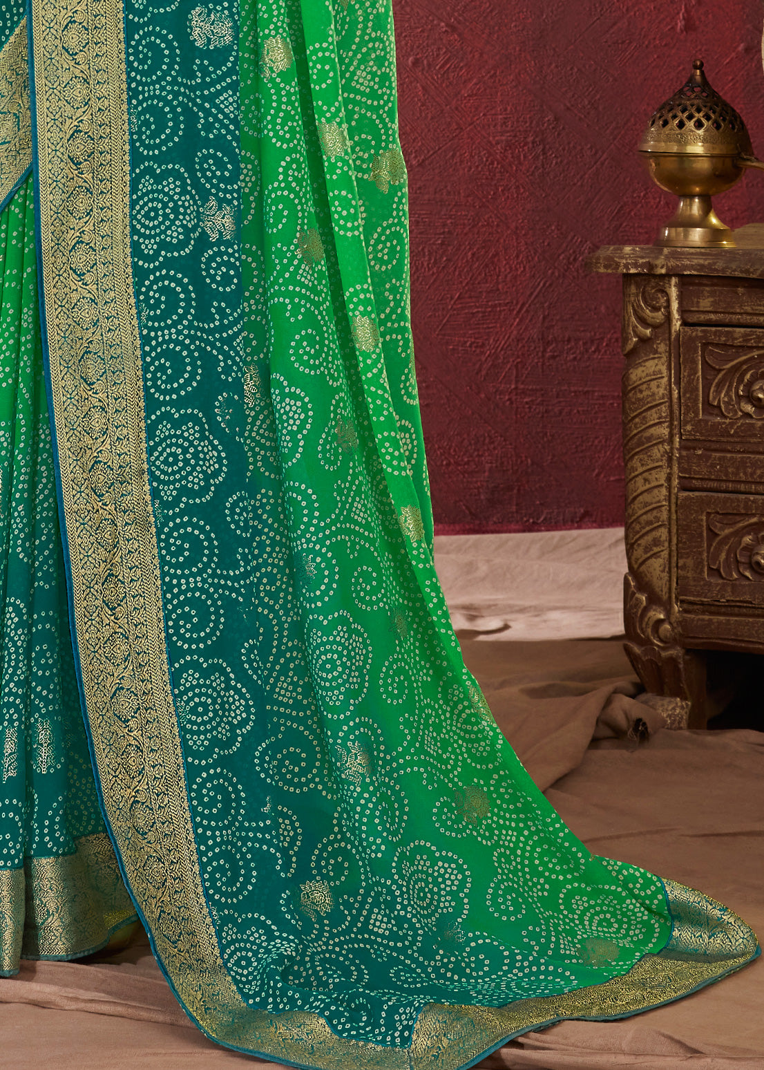 Dual Shades Bandhani Printed Dark Green Sea Green Weightless Georgette Saree With Embroidery Lace